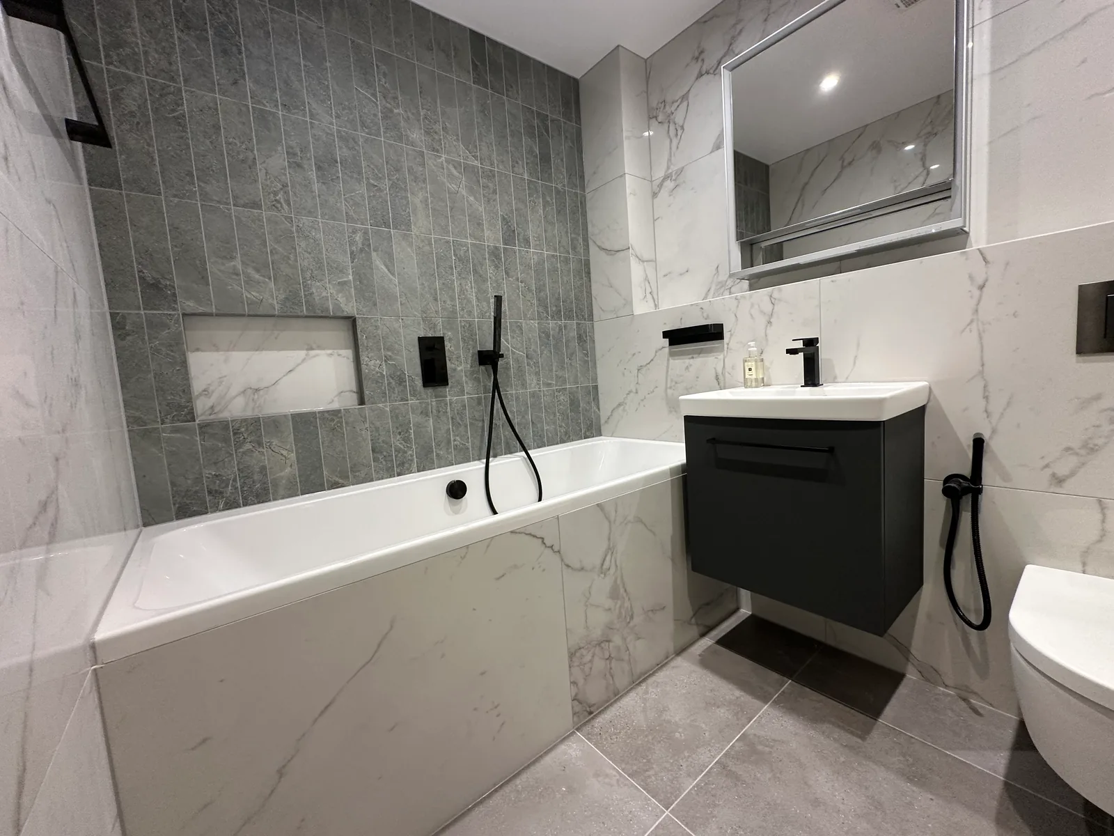 Two complete bathroom renovations in Tuffley, Gloucester 3 Bath, Dark Vanity And Recessed Wall Niche In The First Tuffley Bathroom.