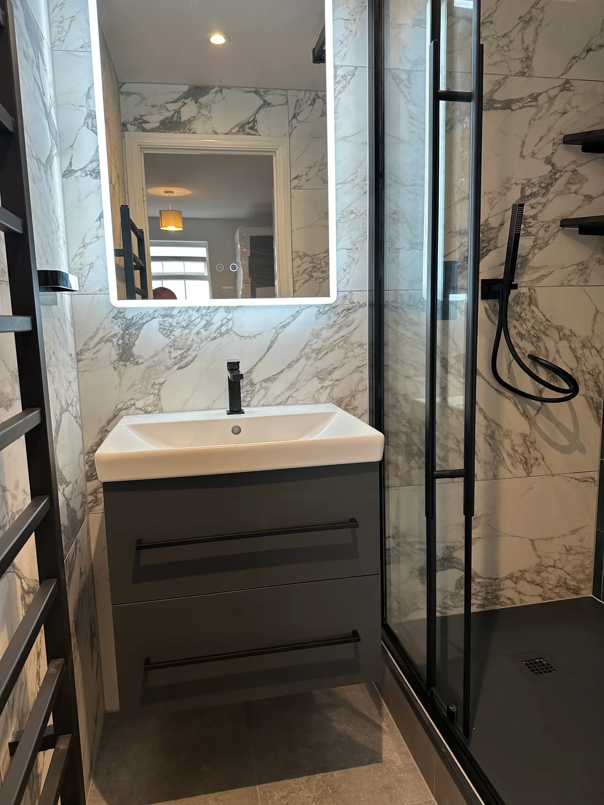 Two complete bathroom renovations in Tuffley, Gloucester 12 Dark Vanity Unit And Illuminated Mirror Beside The Shower In The Second Tuffley Bathroom.